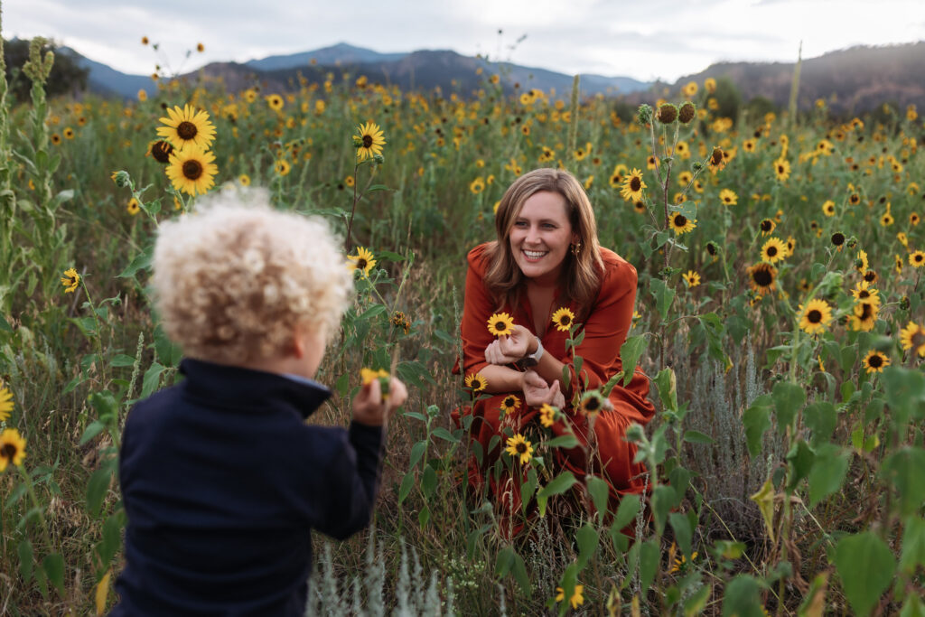 Mom with her son in a field of wildflowers taken in a beautiful location in Colorado Springs.